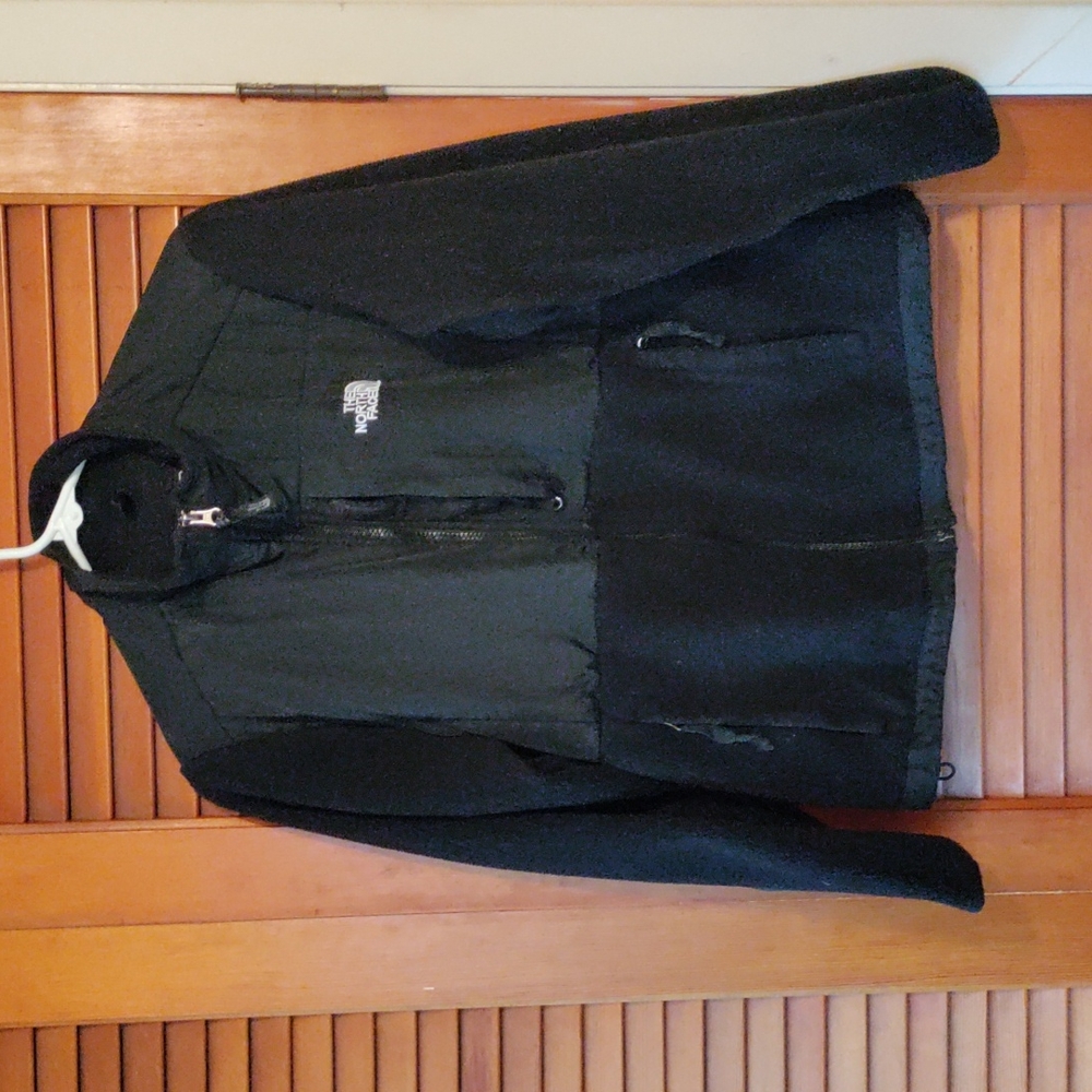 The North Face woman size small black fleece jacket